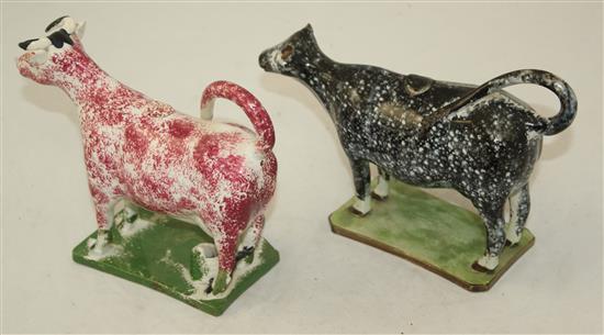 Two Yorkshire type pearlware cow creamers, c.1820, length 20cm, some faults